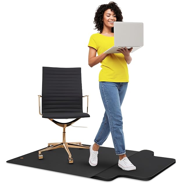 Mushyn two-zone office mat with a smooth rolling area and a cushioned footrest section