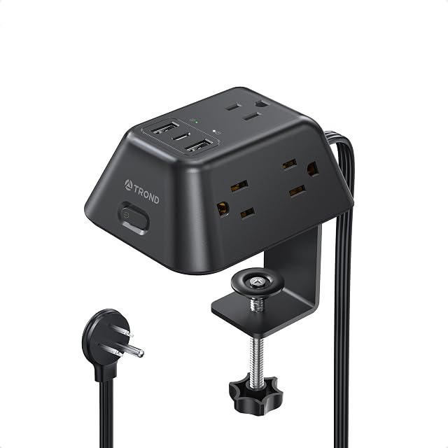 TROND desk clamp power strip mounted to a desk edge with outlets on three faces