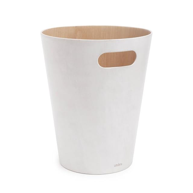 Umbra Woodrow wood waste bin in a home office