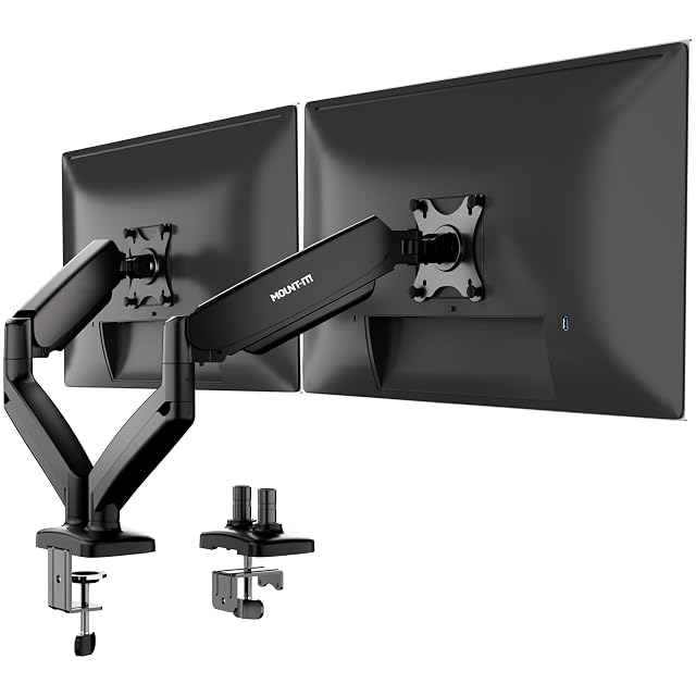Two independent Mount-It! gas spring monitor arms clamped to a desk