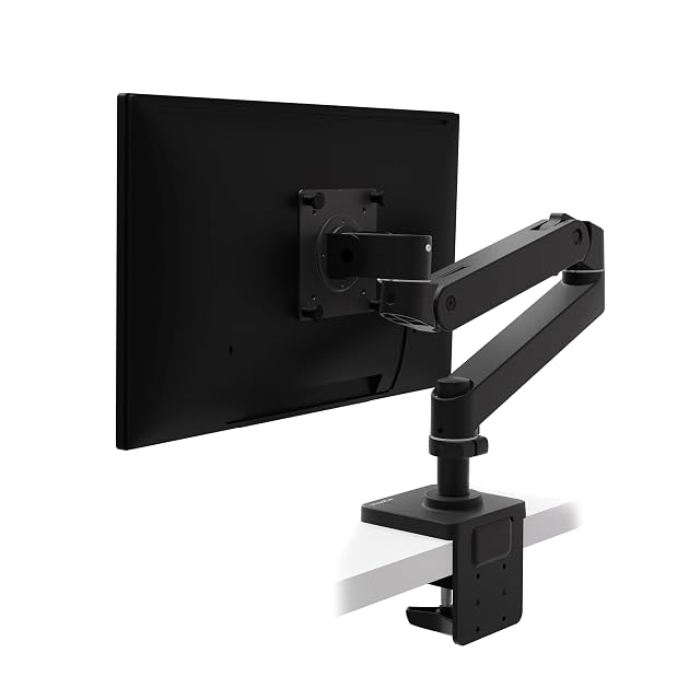 Ergotron LX Pro monitor arm supporting a large monitor above a desk